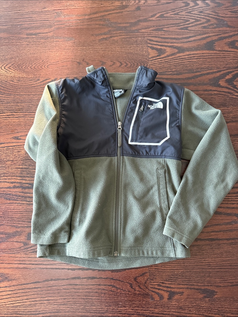 The North Face Kids Olive Green Fleece Jacket with Black Chest Yoke